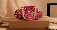 Instamart | Oye Happy | Traditional Pink Potli Bag